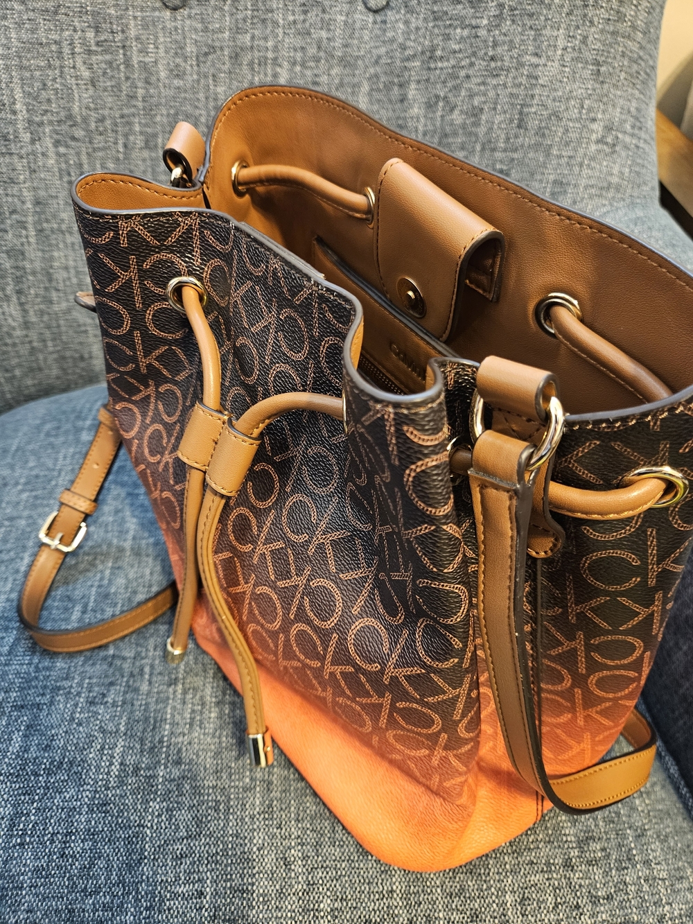 Calvin Klein Brown & Orange Gradient Monogram Drawstring Crossbody Bag - Picture 4 of 8